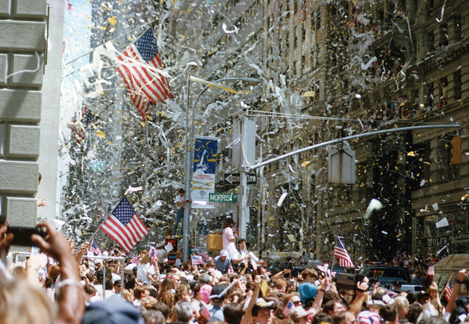 An outdoor gathering with an American flag